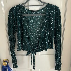Brandy Melville floral top! Loose fitted, can wear various different ways